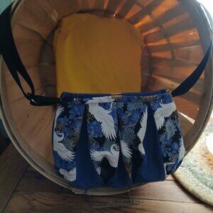 DENIM CROSSBODY HANDBAG WITH Adjustable strap.